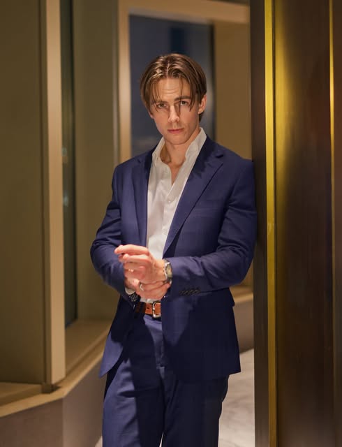 Client portrait in navy suit